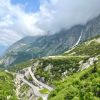 scenic alpine road in swiss alps during summer